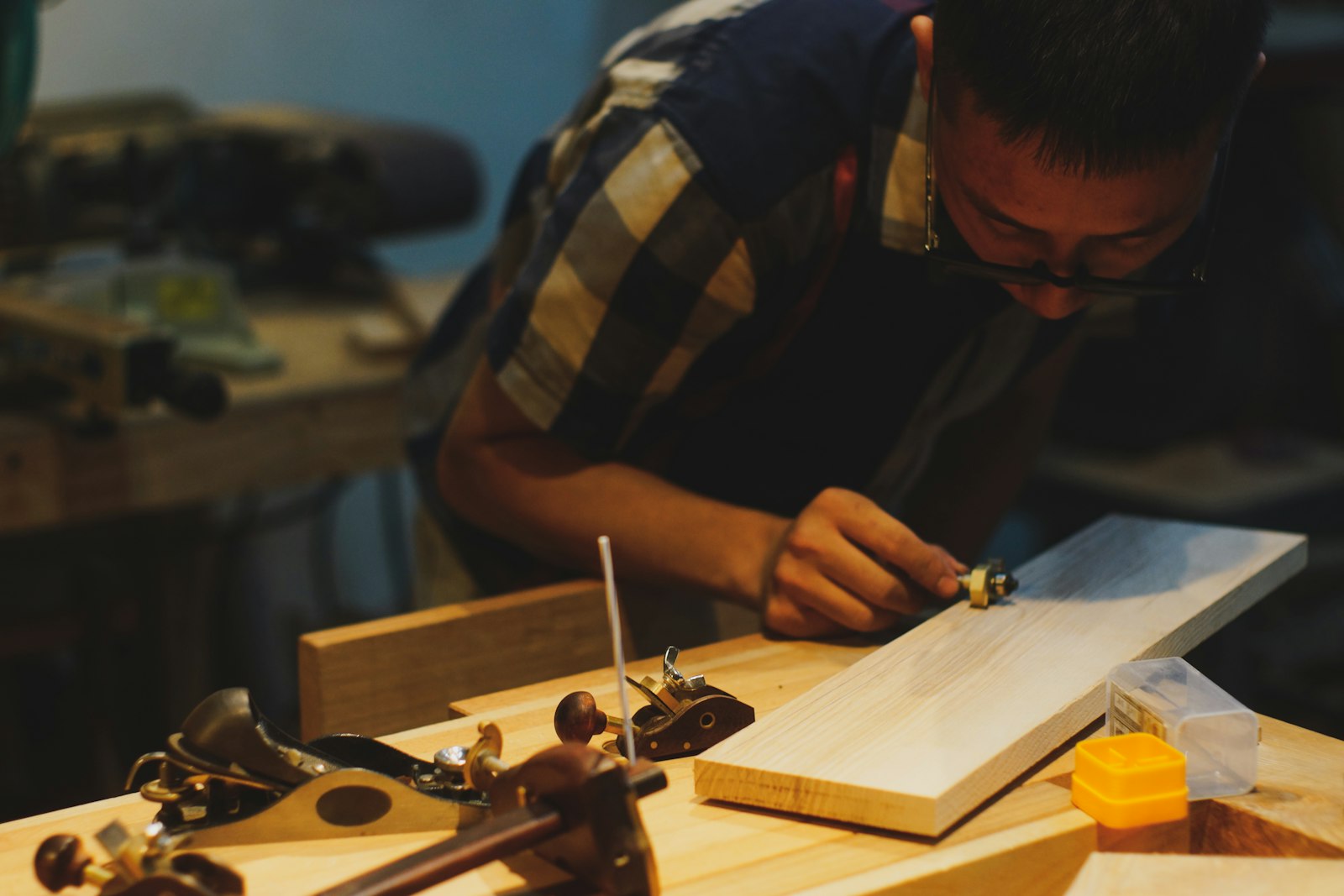SMMJ Pty Ltd carpenter shaping timber in the workshop