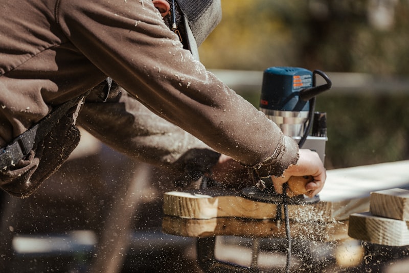 Sanding a timber piece by hand